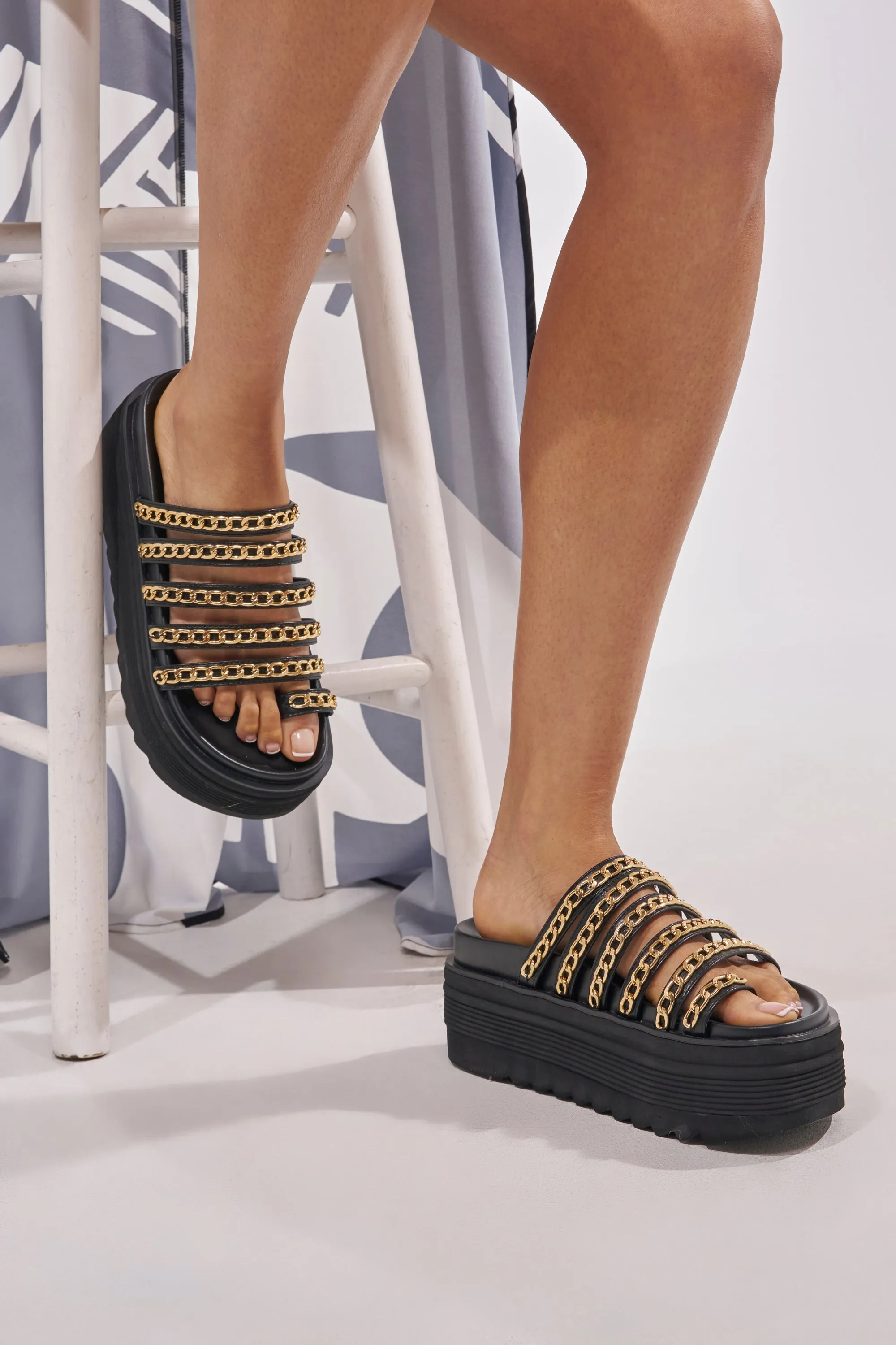 AKIRA CLEMENTE GOLD CHAIN DETAIL FLATFORM SANDAL sold by AKIRA