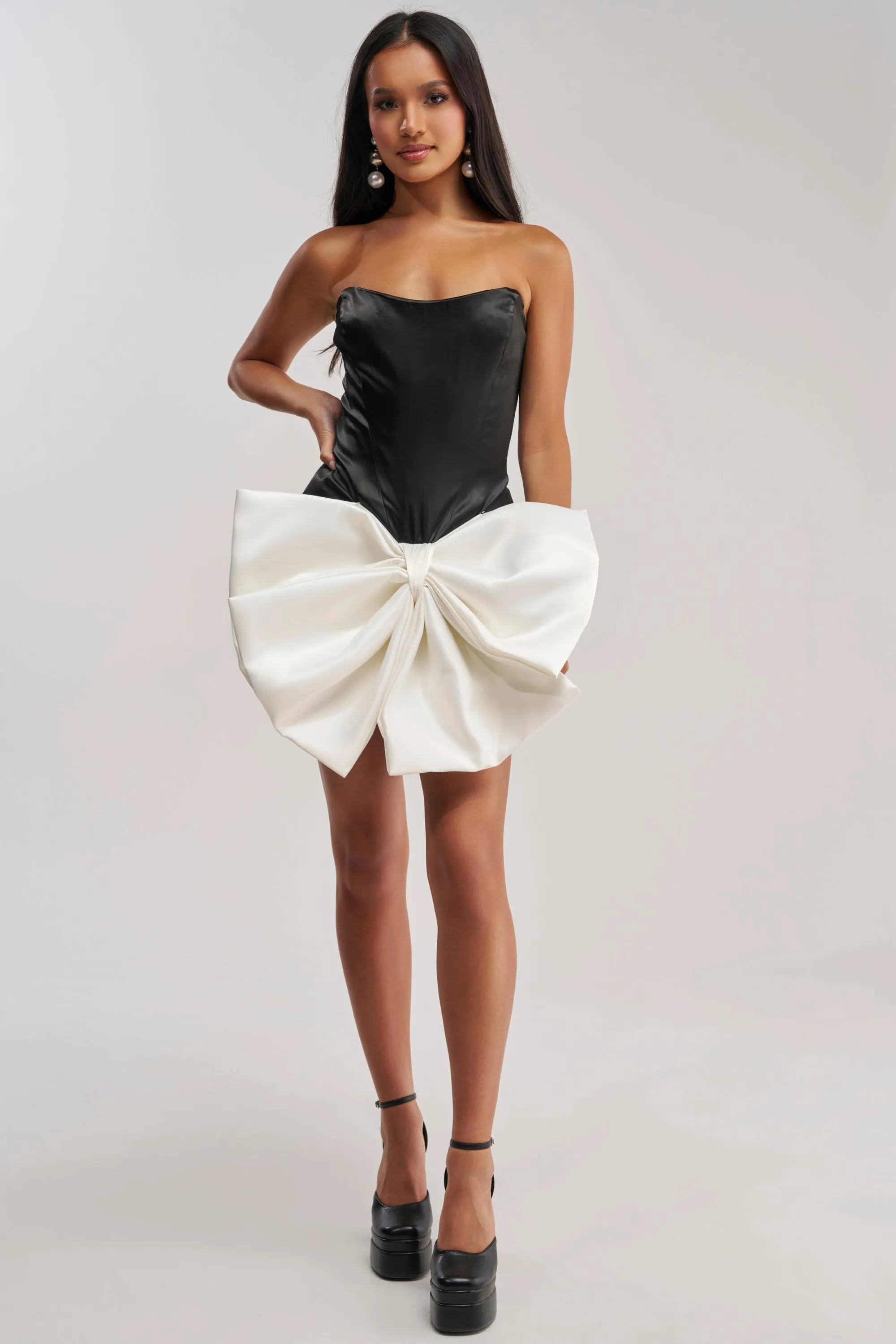 SITTING PRETTY BOW MINI DRESS sold by AKIRA