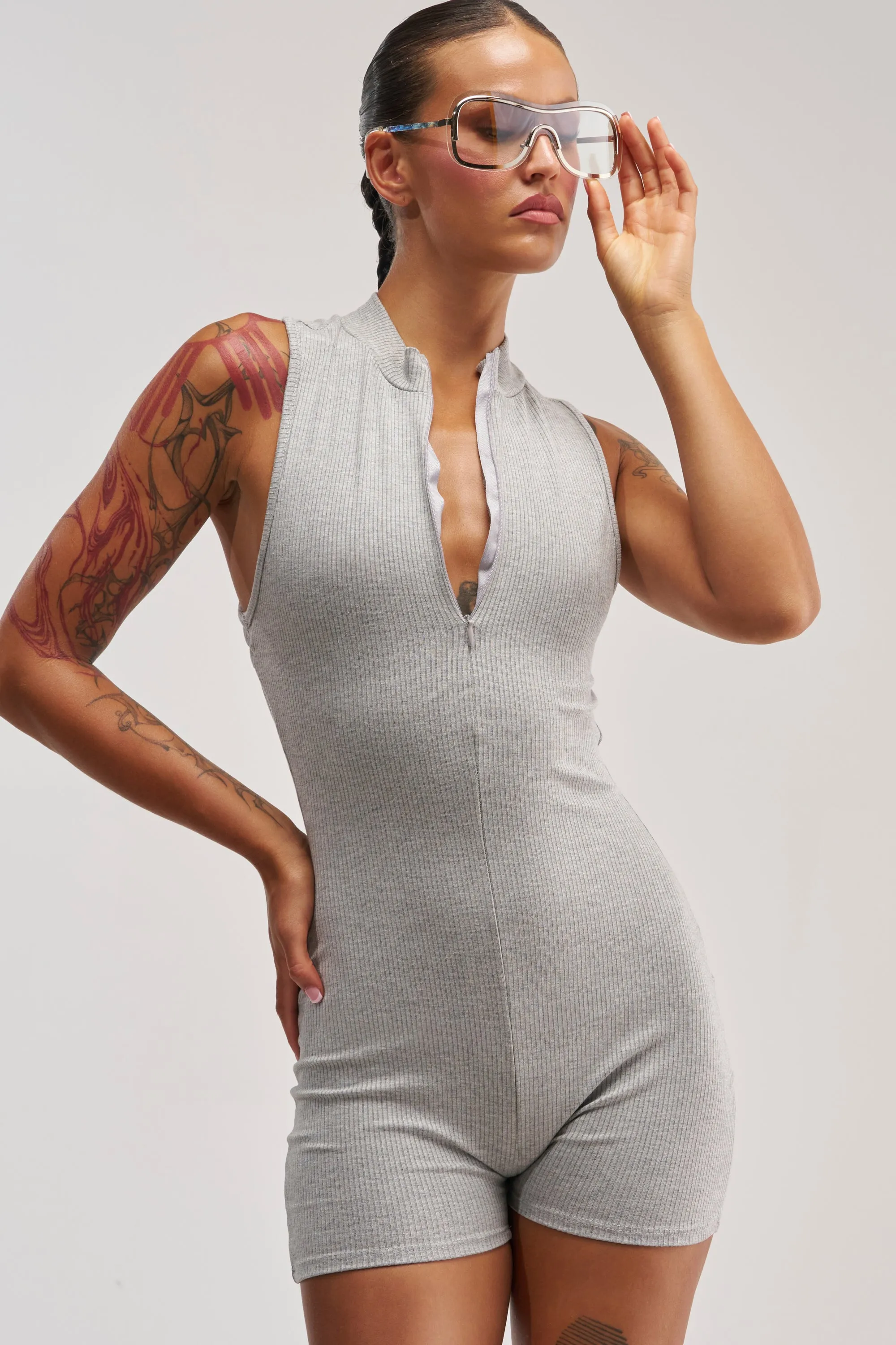 EFFORTLESS ICON ZIP UP KNIT ROMPER sold by AKIRA