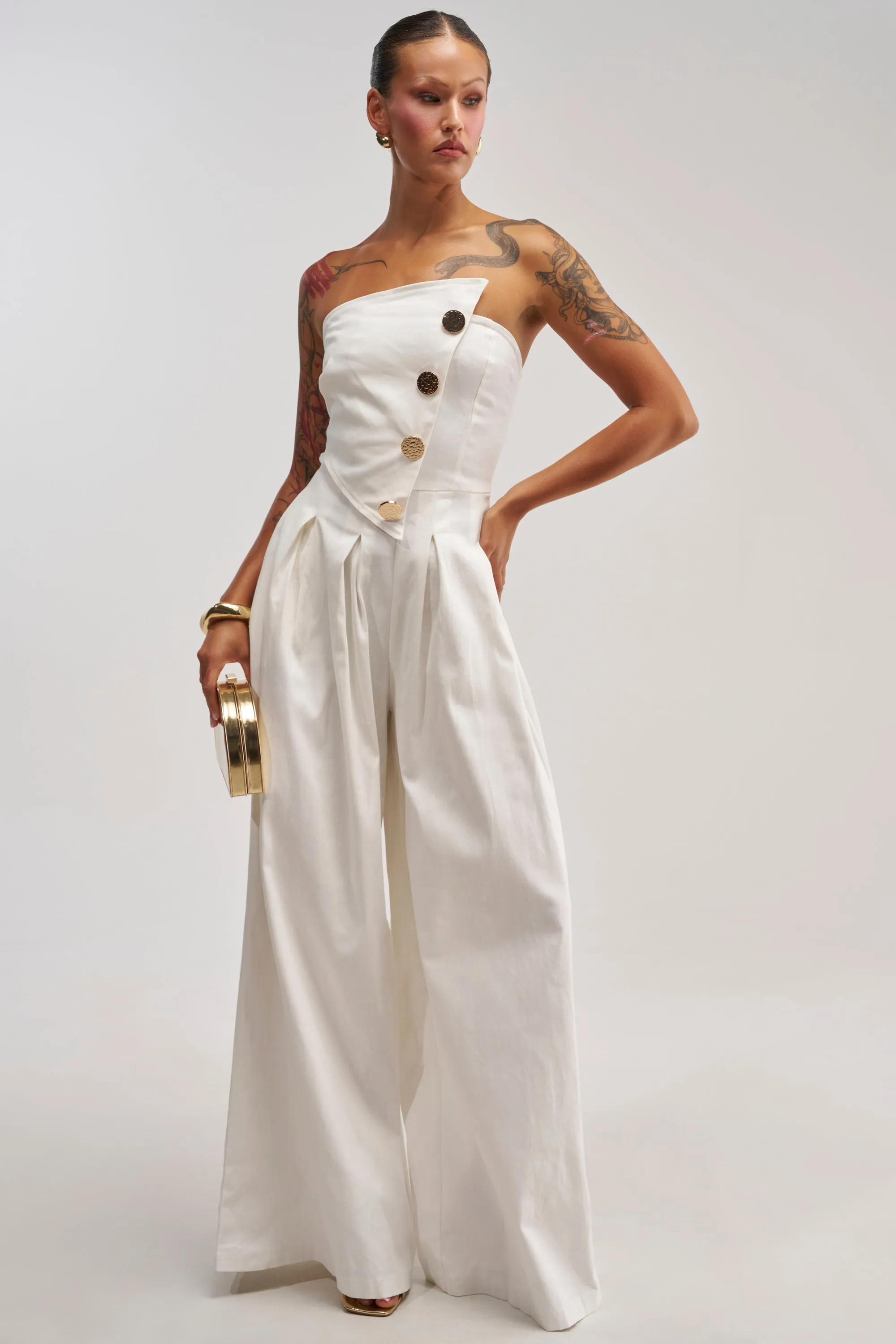 MILANO WOVEN JUMPSUIT IN WHITE sold by AKIRA