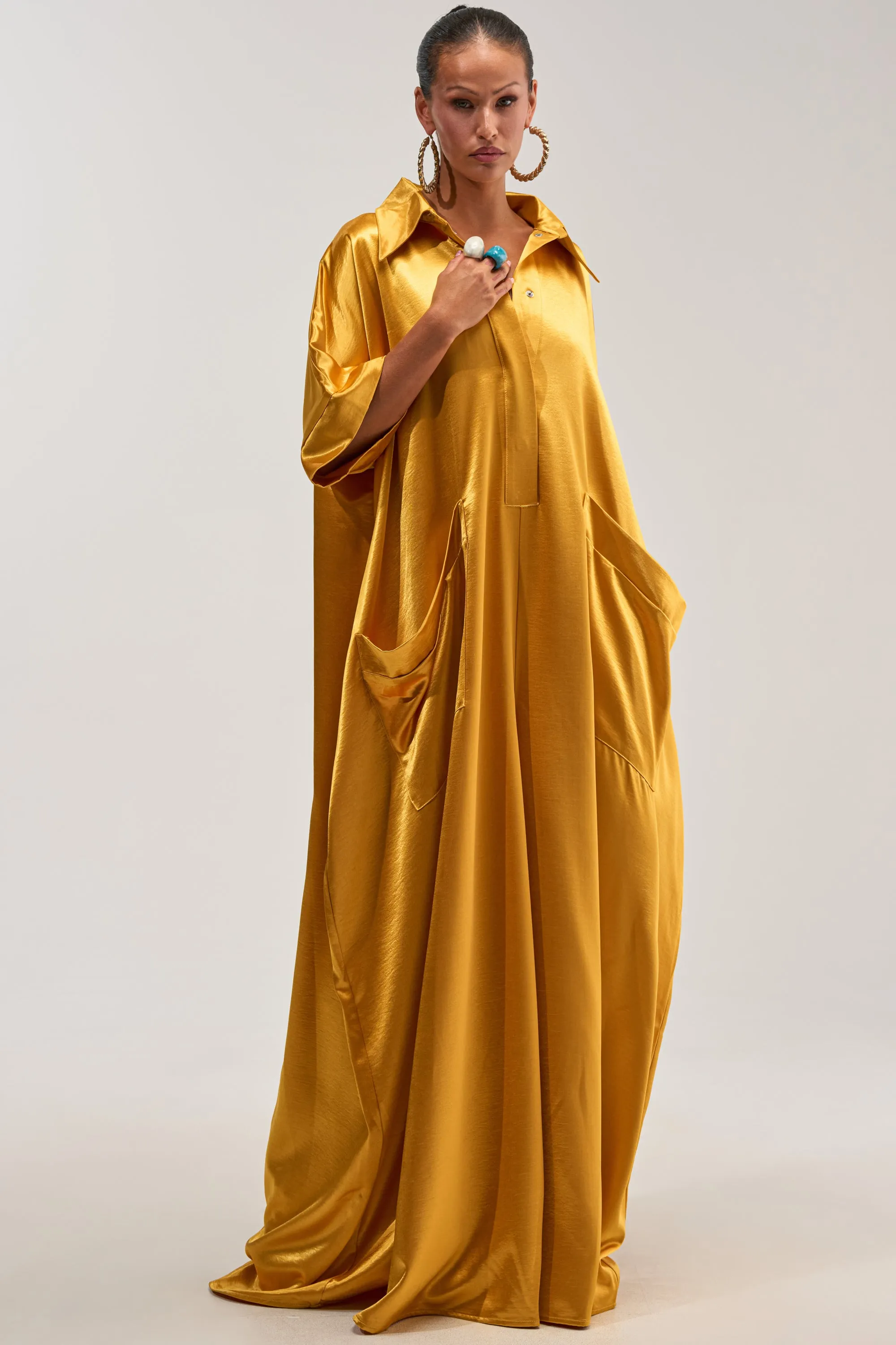 SHE'S RICH OVERSIZED JUMPSUIT IN MUSTARD sold by AKIRA