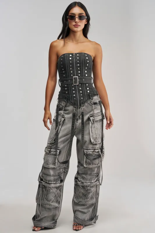PERK UP STUDDED CORSET IN DENIM made by AKIRA