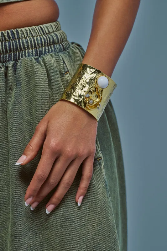 LISTEN CLOSELY METAL CUFF IN GOLD made by AKIRA
