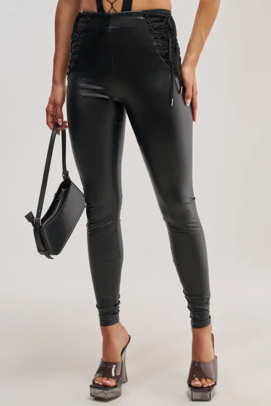 SEXY AS HELL LACE UP LEGGING made by AKIRA