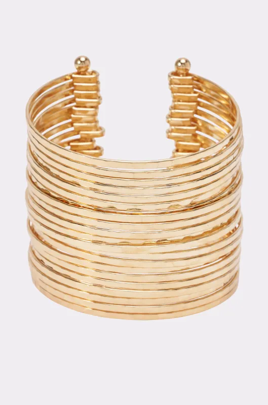 GOLD HAMMERED CUFF made by AKIRA