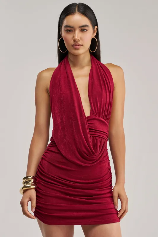 HAUTE HEAT SWOOPED MINI DRESS IN BURGUNDY made by AKIRA