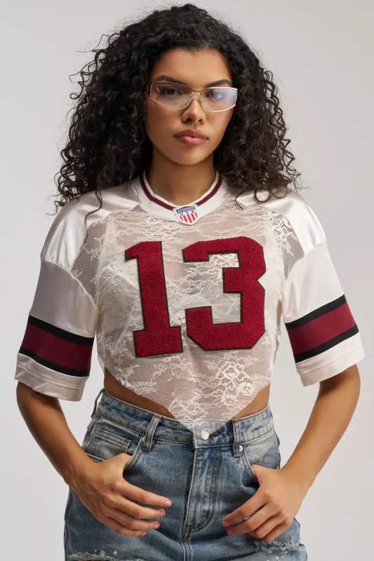 LUCKY LACE JERSEY TOP IN IVORY MULTI made by AKIRA