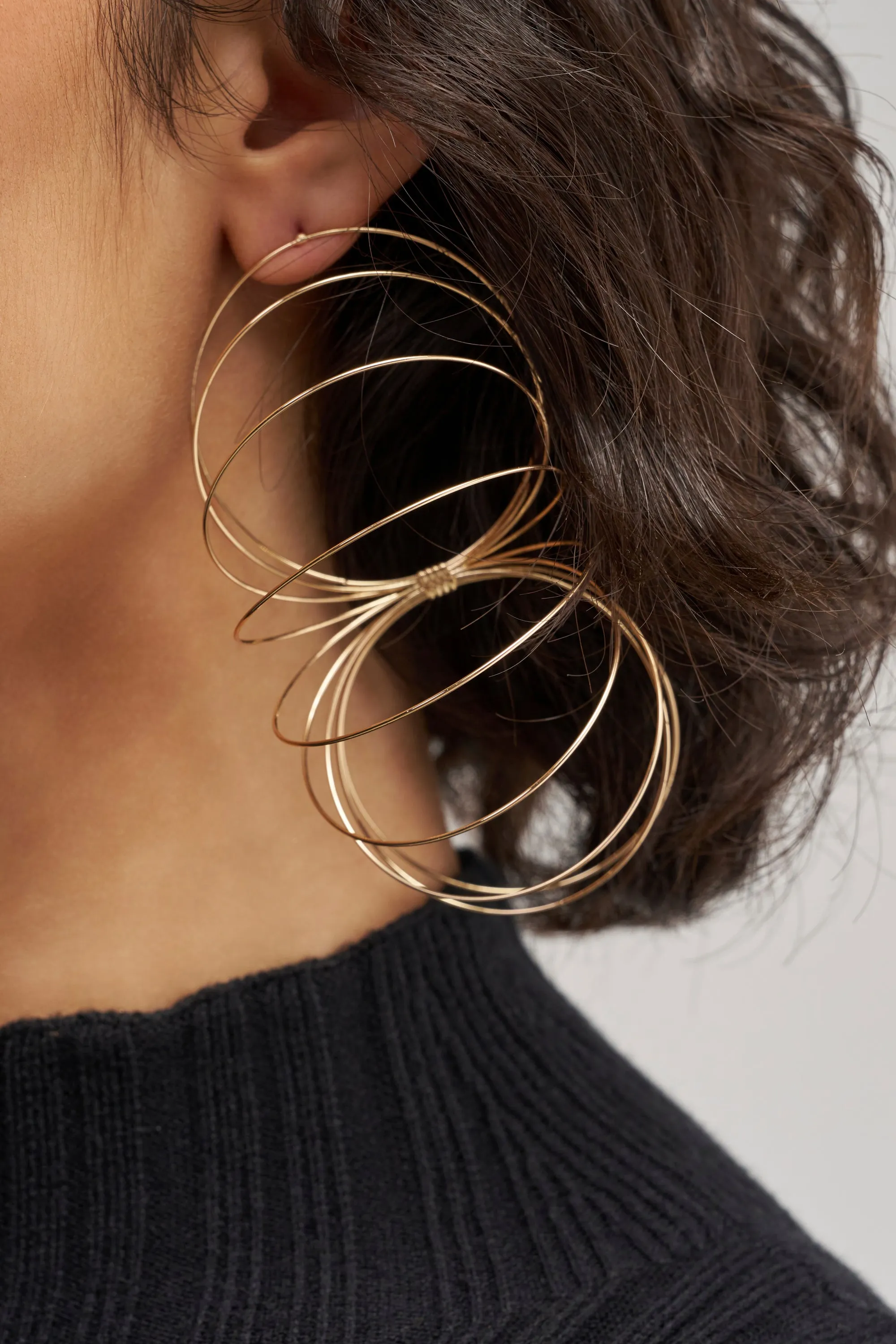 GOLD SLINKY EARRINGS sold by AKIRA product image thumbnail 3