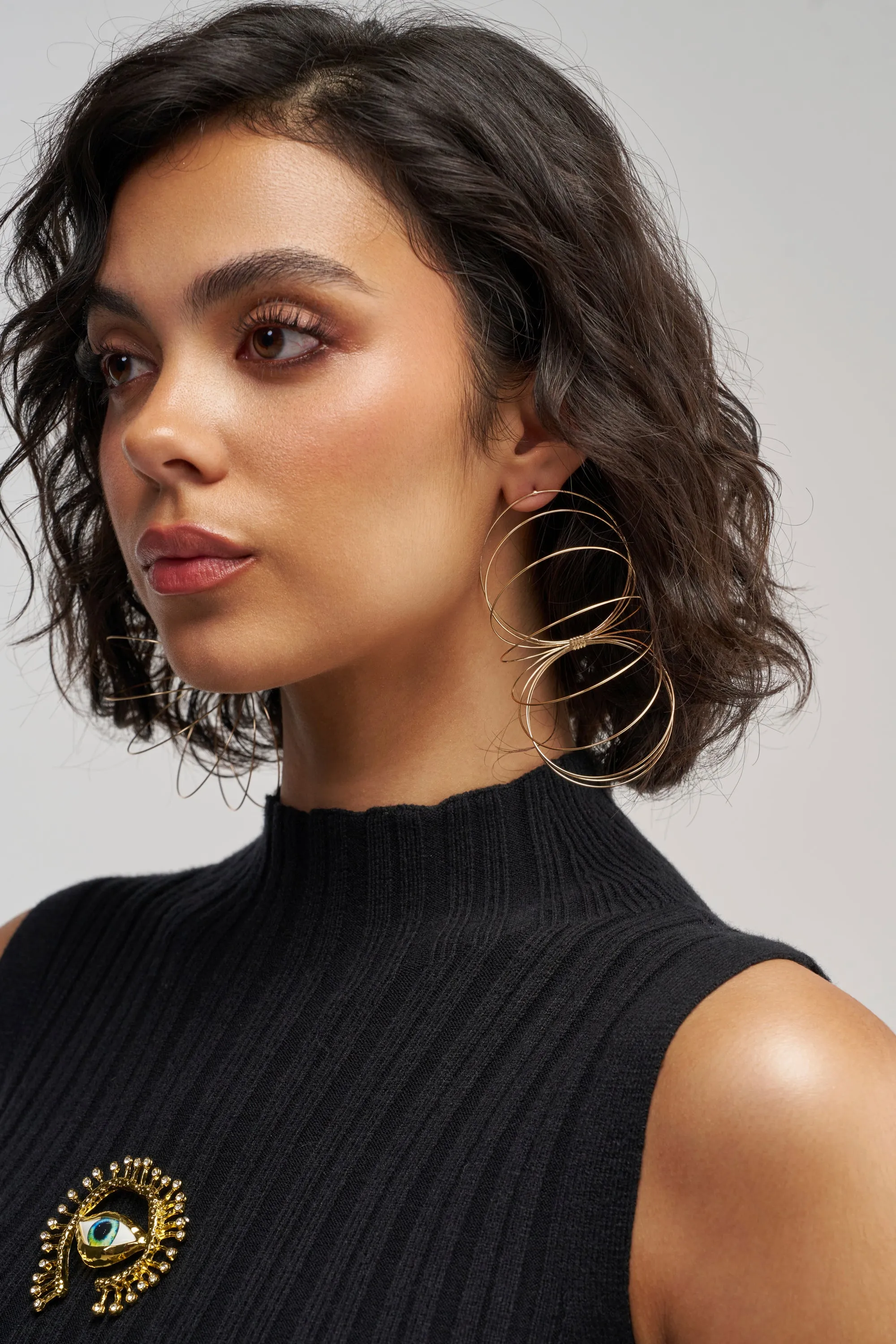 GOLD SLINKY EARRINGS sold by AKIRA product image thumbnail 2