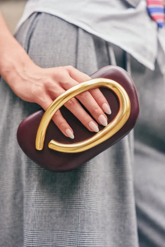 THE CUTEST BURGUNDY CLUTCH made by AKIRA
