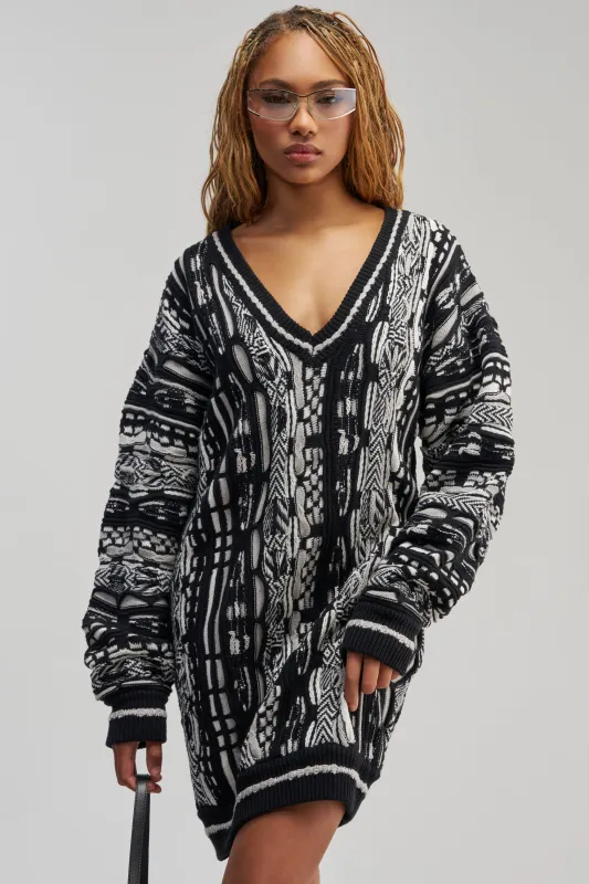 FEELIN COZY V-NECK SWEATER DRESS IN BLACK AND WHITE made by AKIRA