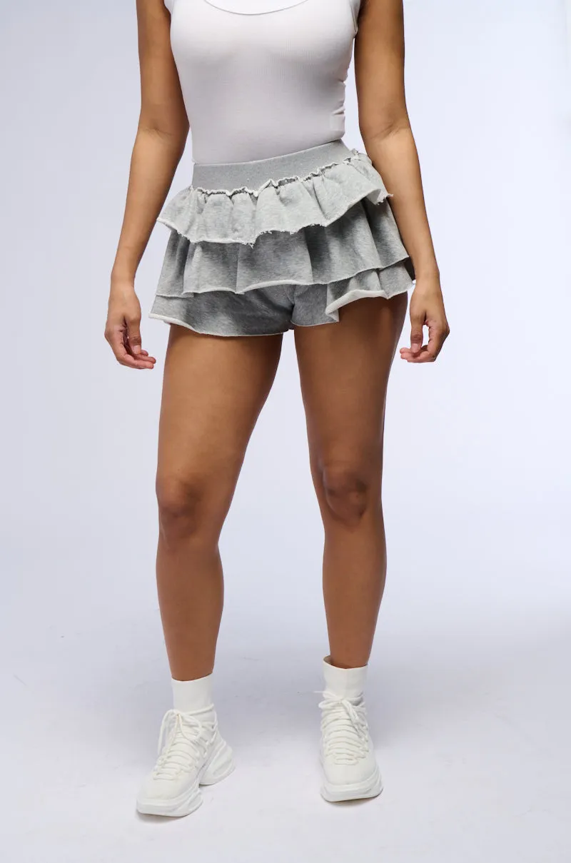 ON THE MOVE RUFFLE SKORT sold by AKIRA