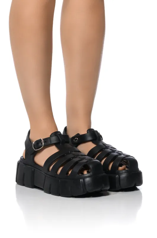 MUMU FLATFORM CLOG IN BLACK made by AKIRA