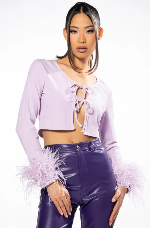 CHER TIE FRONT FEATHER CUFF LONG SLEEVE TOP sold by AKIRA