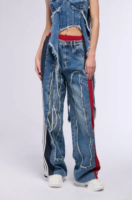 ALL AROUND THE WORLD PATCHWORK DENIM JOGGER PANT IN RED MULTI sold by AKIRA
