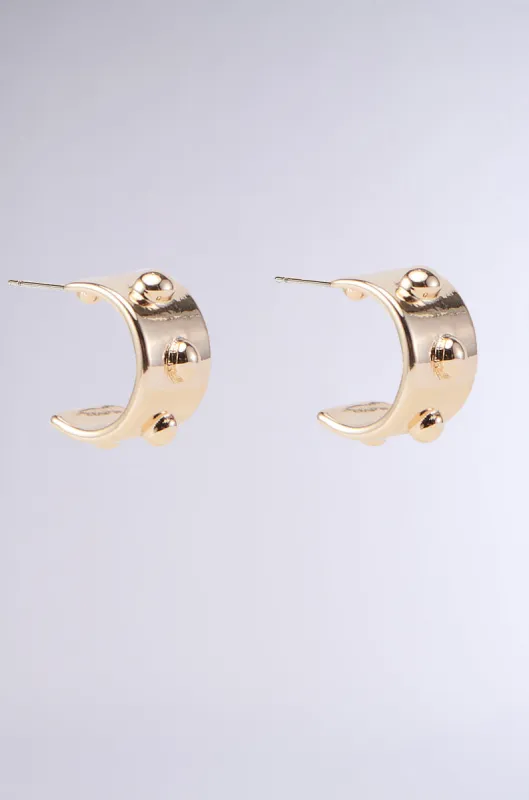 CHUNKY GOLD HOOP EARRING sold by AKIRA