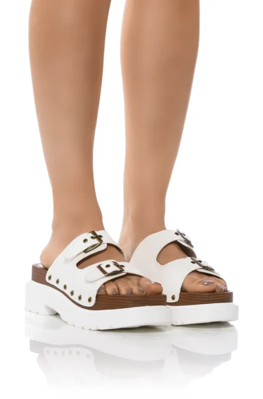 SLOW MOTION WHITE FLATFORM SANDAL sold by AKIRA