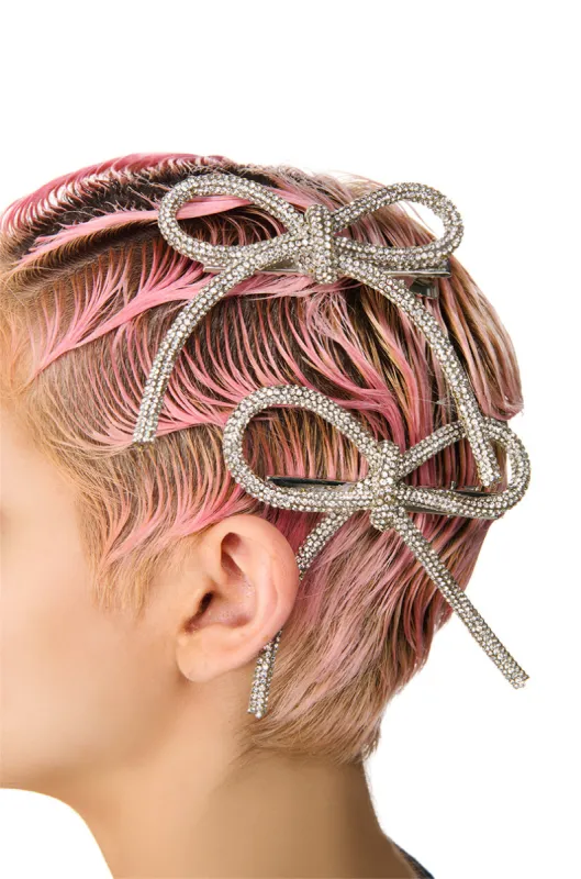 BLING BOW HAIR CLIP SET sold by AKIRA