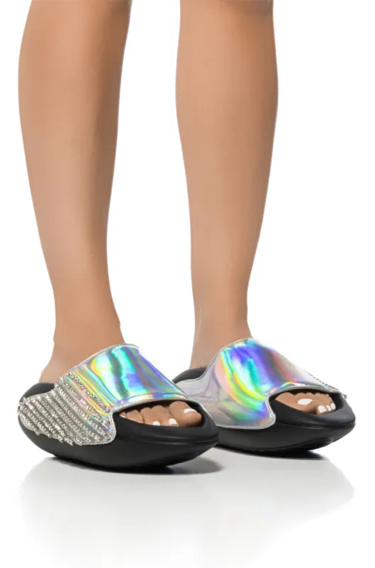 AKIRA BUGGY BLUE METALLIC EMBELLISHED SLIDE sold by AKIRA