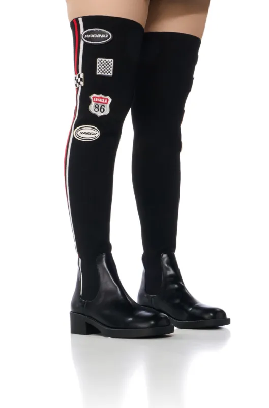 REVITUP BLACK AND RED OVER THE KNEE BOOT sold by AKIRA