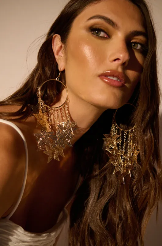 STAR POWER HOOP EARRING sold by AKIRA