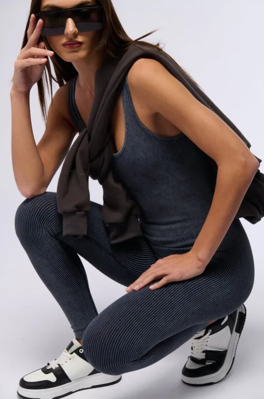 HOT GIRL WALK SLEEVELESS CATSUIT IN CHARCOAL sold by AKIRA