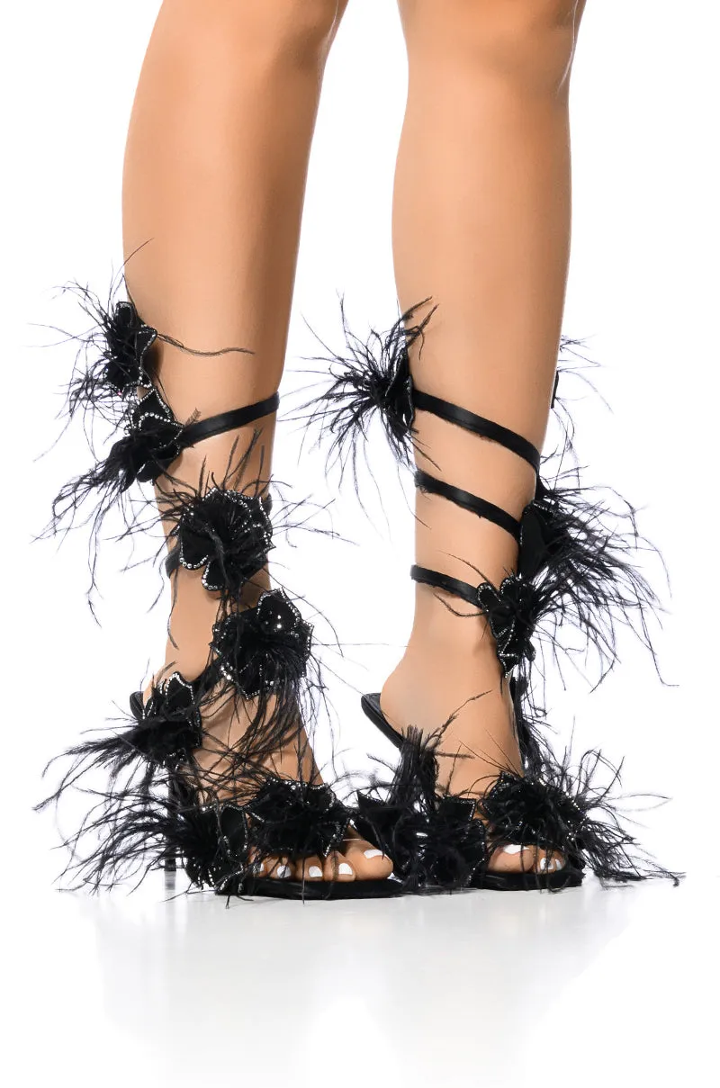 AZALEA WANG JAYLENE BLACK FLOWER EMBELLISHED COIL SANDAL sold by AKIRA