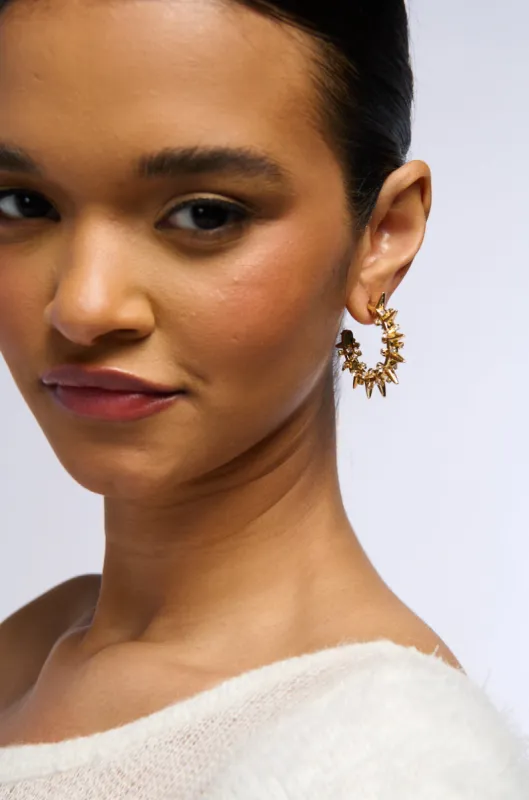 I BITE EARRING sold by AKIRA