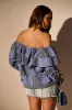 OFF SHOULDER PATCHWORK DENIM JACKET sold by AKIRA