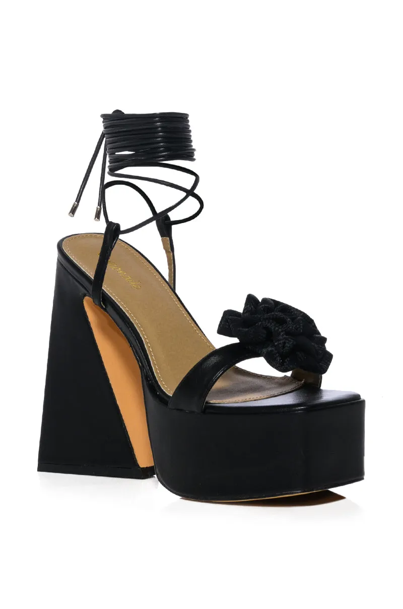 SOMETHING SWEET CHUNKY PLATFORM LACE UP SANDAL WITH FLOWER DETAIL IN BLACK sold by AKIRA product image thumbnail 5