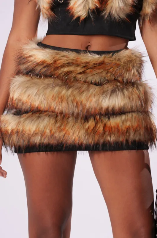 DRIVE ME WILD FUR MINI SKIRT sold by AKIRA