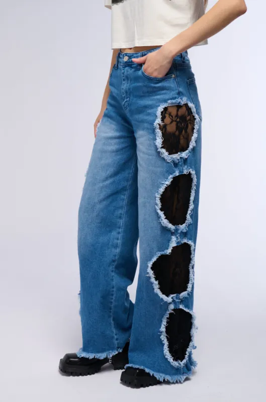 CUT OUT DETAIL WIDE LEG JEAN sold by AKIRA