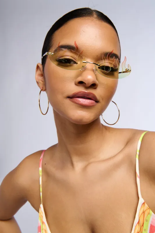 IM FLAME GLASSES sold by AKIRA