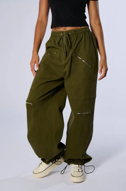 CALM DAY FLEX JOGGER IN OLIVE sold by AKIRA