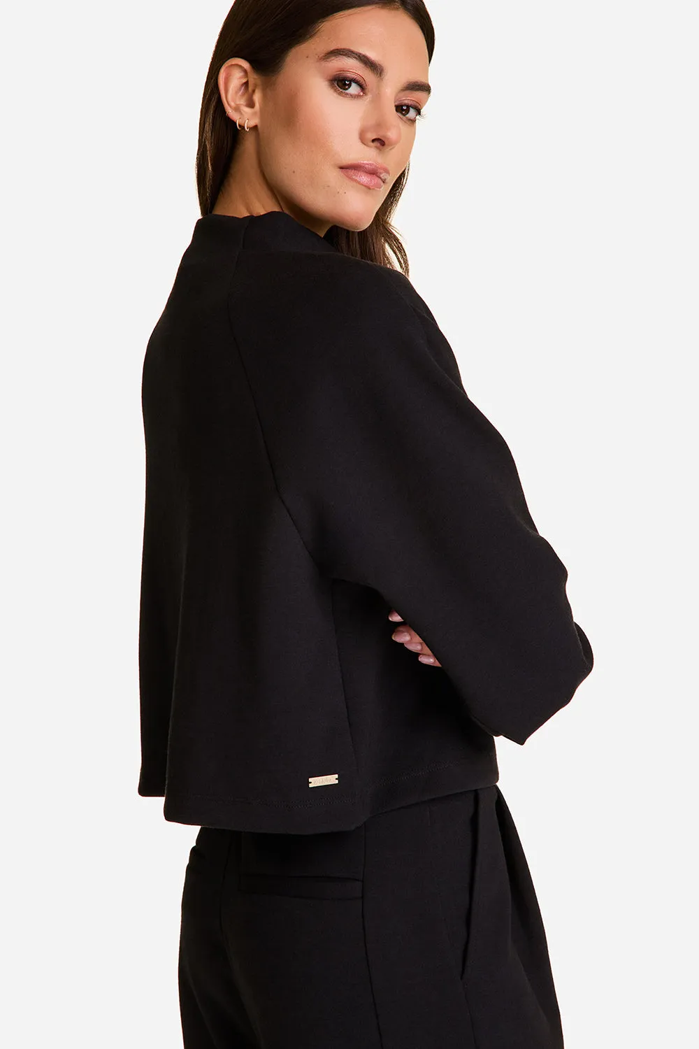 Phoebe Mock Knit sold by Alala