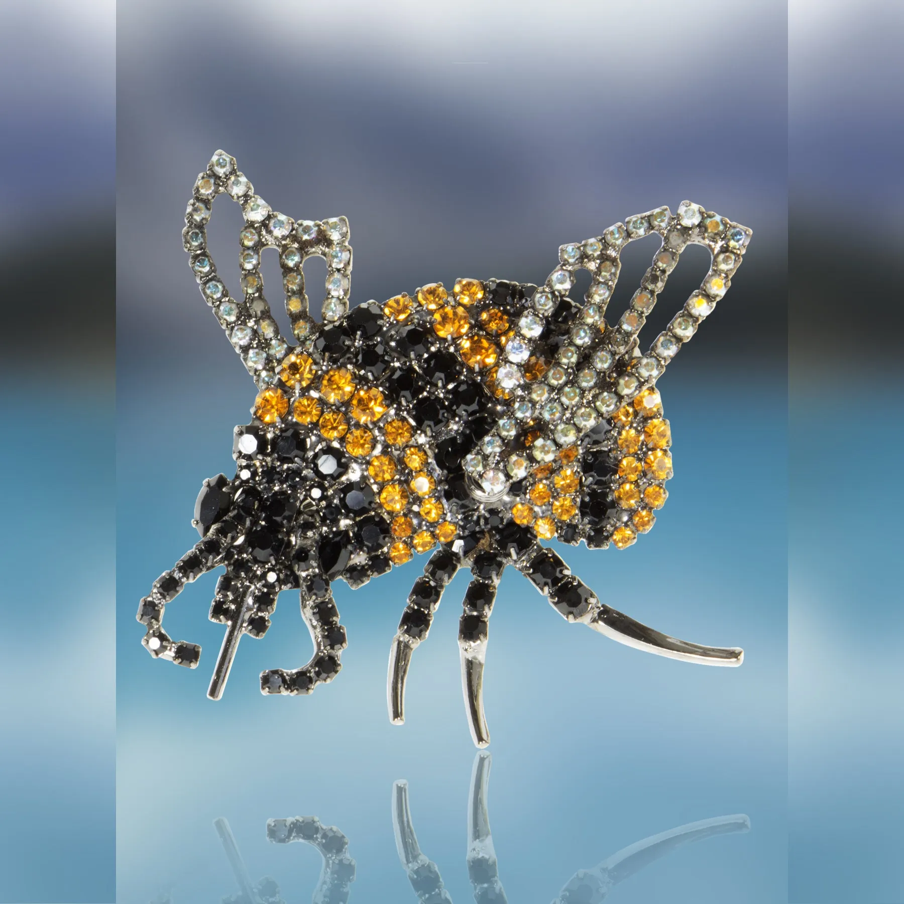 Bumble Bee Pin Using Jet and Topaz Swarovski Stones with Movable Wings by Albert Weiss sold by Albert Weiss