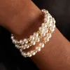 Sea Sultry Cuff Bracelet, Soft Pearl White sold by Alex and Ani