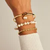 Pearl Heart + Crystal Charm Clip Bangle sold by Alex and Ani