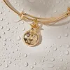 Ladybug Charm Bangle Bracelet sold by Alex and Ani
