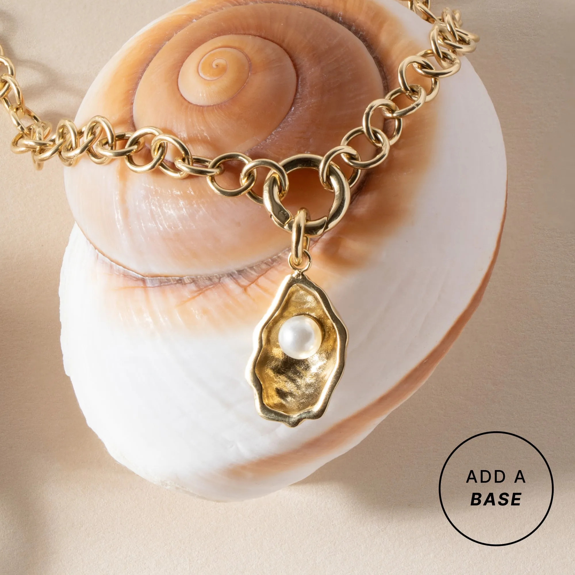 Oyster Interchangeable Charm sold by Alex and Ani