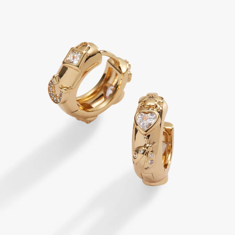 Love and Luck Huggie Hoops sold by Alex and Ani