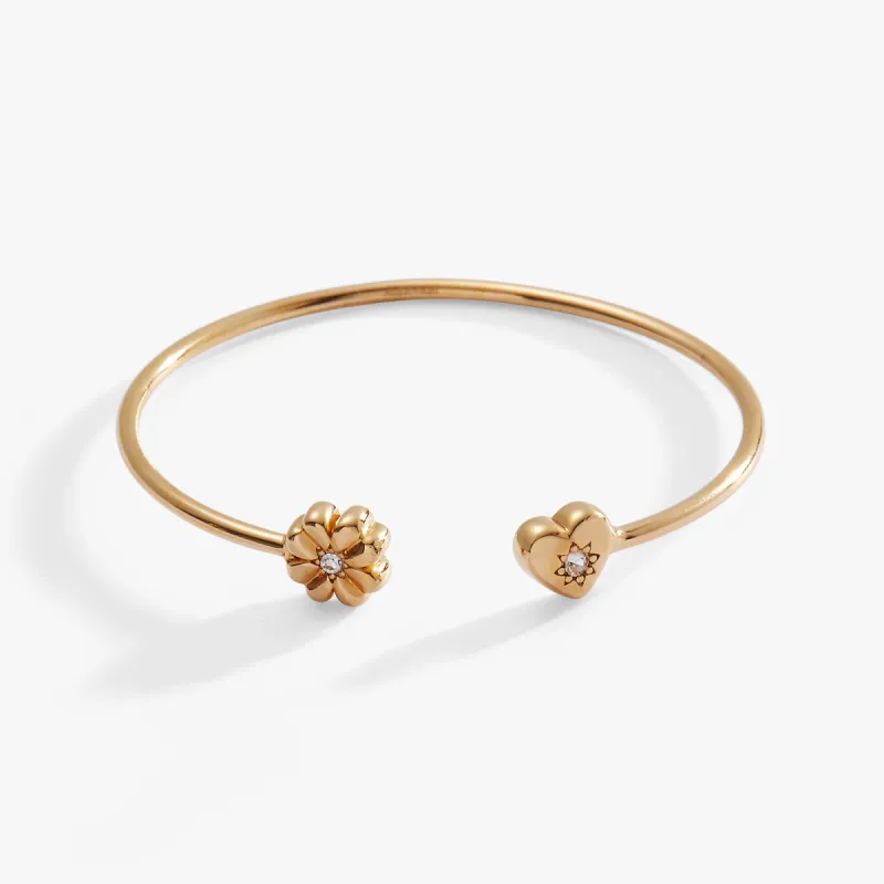 Love & Luck Heart and Clover Flex Cuff sold by Alex and Ani