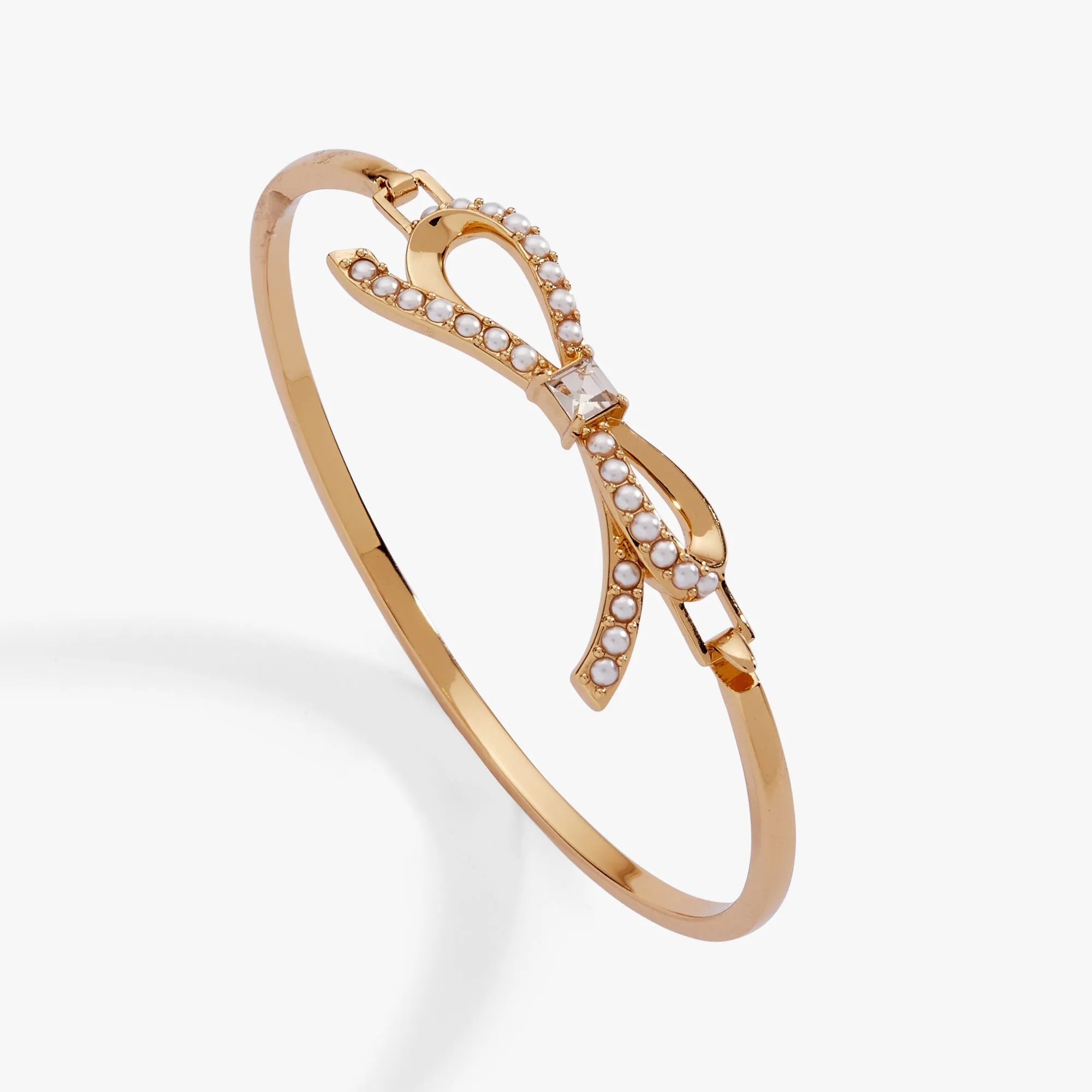 Bow Pearl Coquette Tension Bangle sold by Alex and Ani