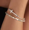 Spiritual Armor Cross Inline Charm Bangle sold by Alex and Ani