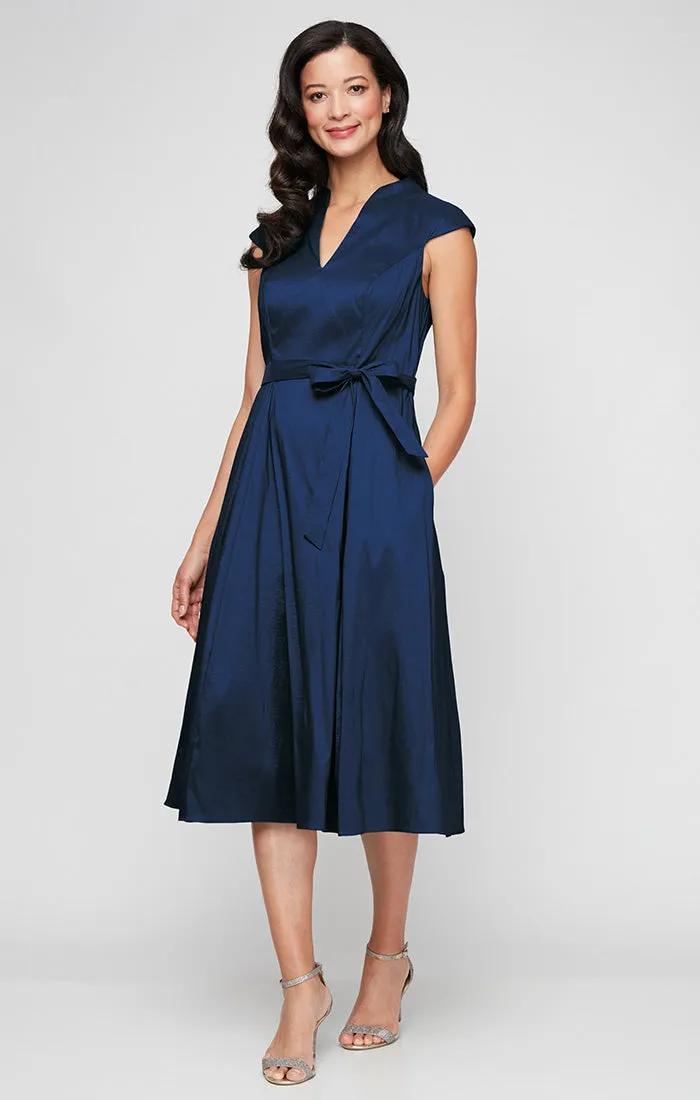 Stretch Taffeta Party Dress with A-Line Skirt & Tie Waist Detail sold by Alex Evenings