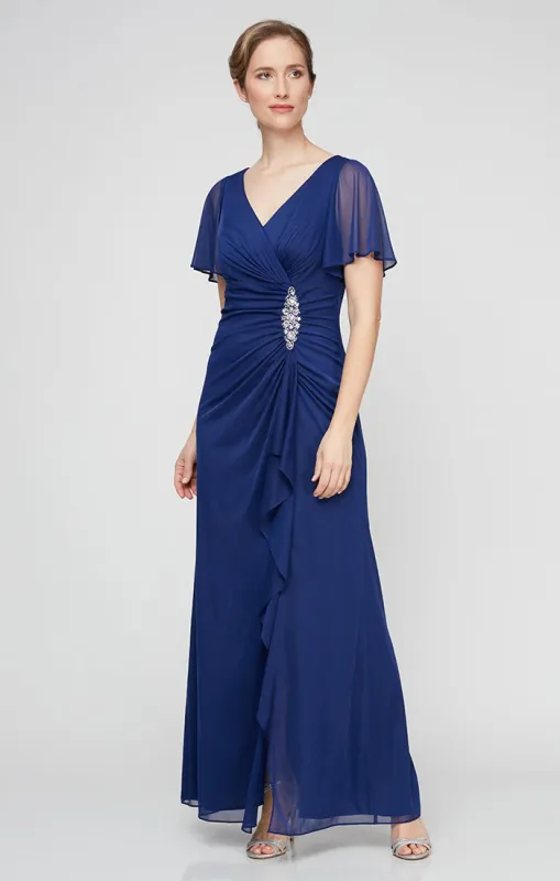 Long Surplice Neckline Mesh Dress with Flutter Sleeves, Embellishment at Hip and Cascade Skirt Detail sold by Alex Evenings