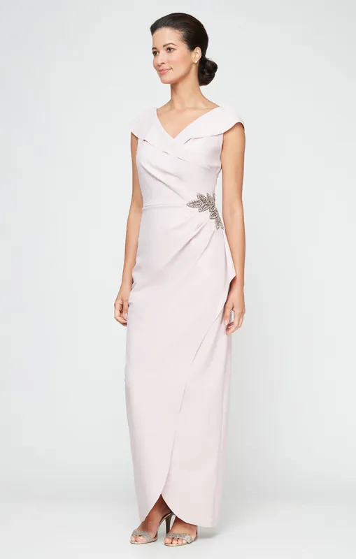*Sleeveless Portrait Collar Sheath Dress wIth Embellishment Detail at Hip and Cascade Tulip Overlay Skirt sold by Alex Evenings