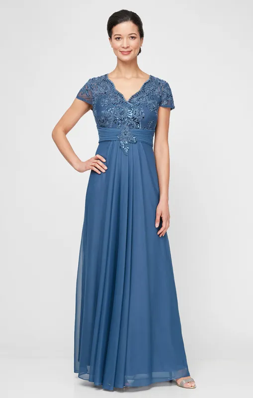 Petite Long Surplice Neckline A-Line Dress with Embroidered Pleated Waist and Scallop Detail sold by Alex Evenings