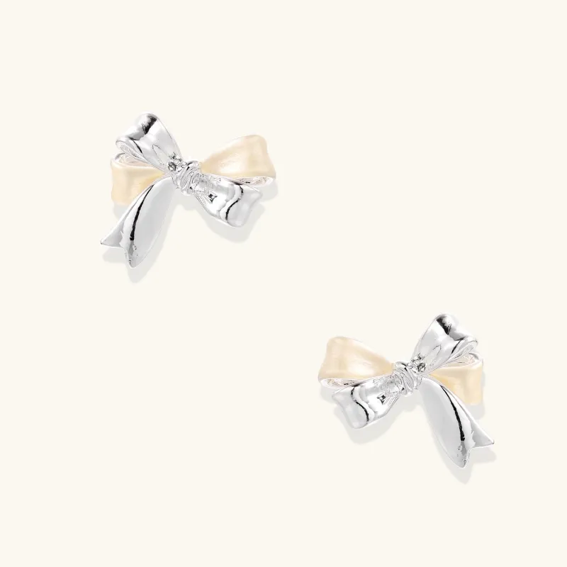 Pearl Bow Studs sold by Alex Evenings