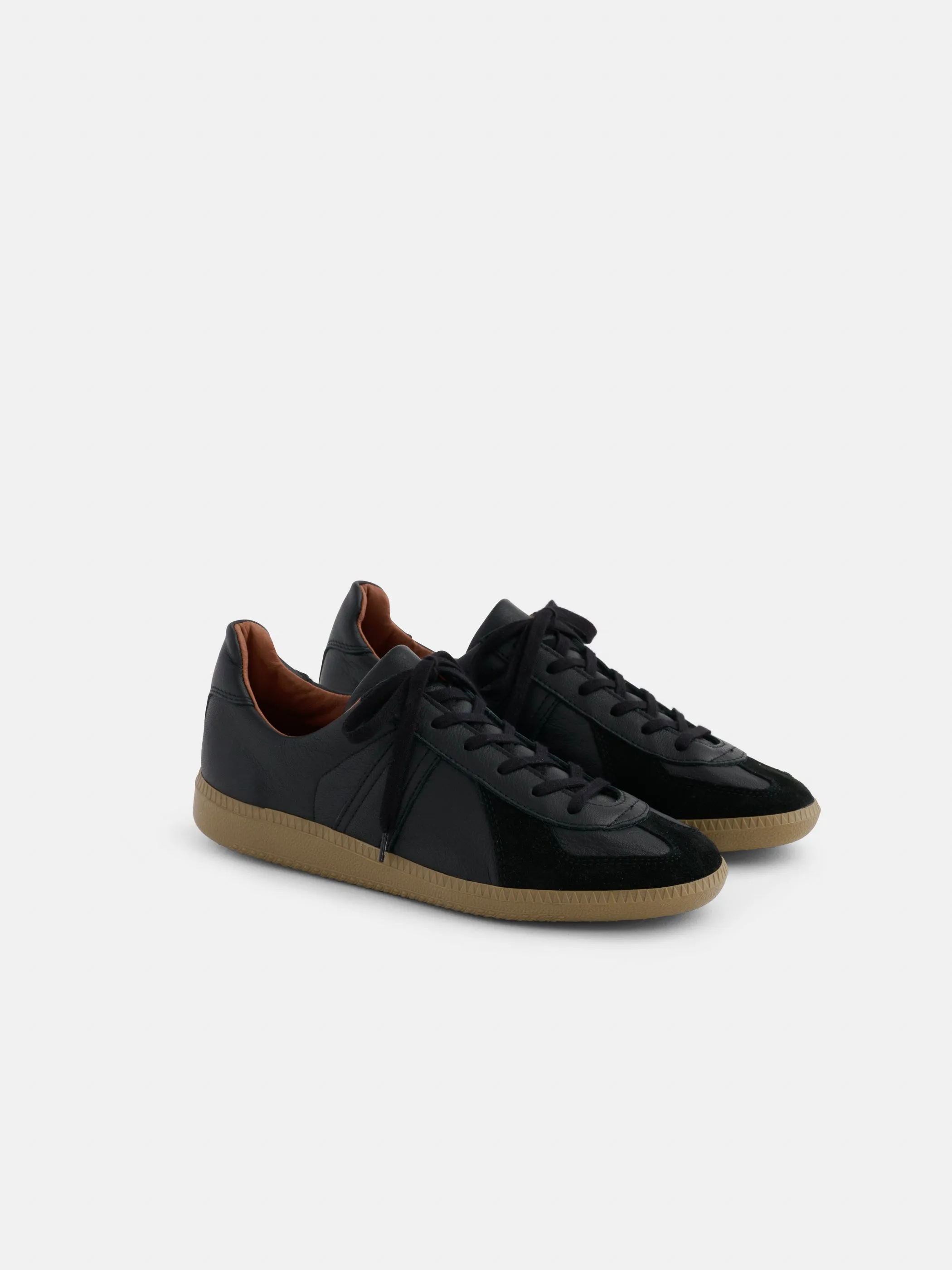 Reproduction of Found German Military Trainers sold by Alex Mill